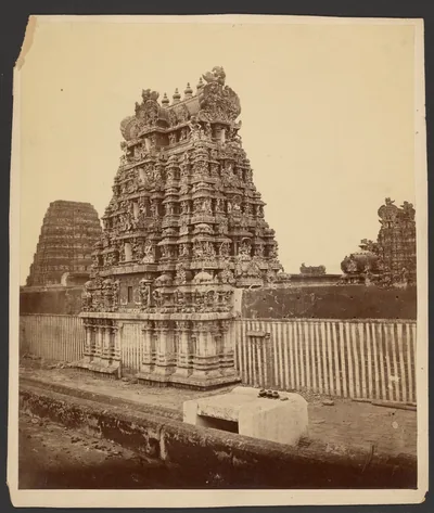 Old photo of a richly carved temple tower
