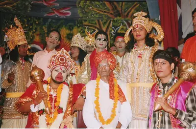 Actors dressed as Rama, Lakshmana and other heroes of the Ramayana in crowns and garlands