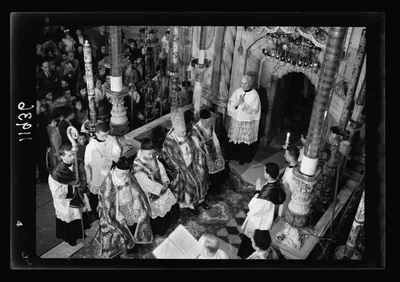 Clergy in robes lead an Easter service in an old church