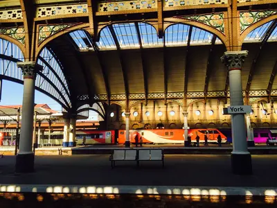 A grand old railway station in golden light