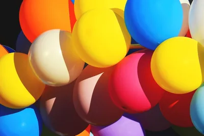 Close view of many colourful balloons