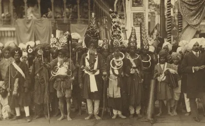 Old photograph of Akali Sikh warriors in tall turbans with steel rings
