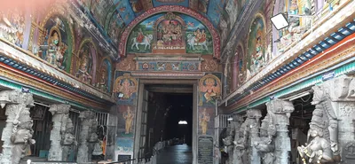 The painted ceiling and carved pillars of the Ashta Sakthi Mandapam at the Meenakshi temple, Madurai