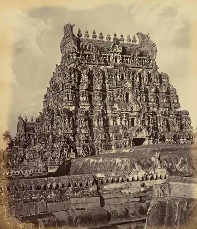 Old photo of a richly carved temple tower