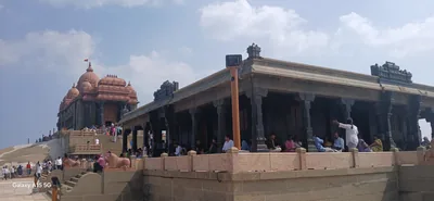 The Vivekananda Rock Memorial hall under a blue sky in Kanyakumari