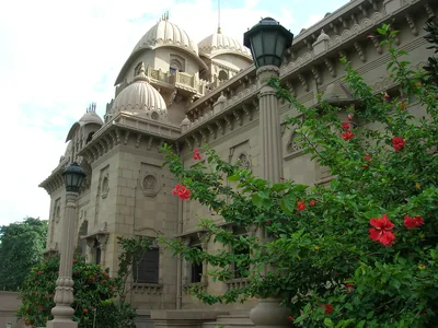 The temple at Belur Math among trees and flowers