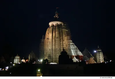 The Jagannath Temple tower lit at night