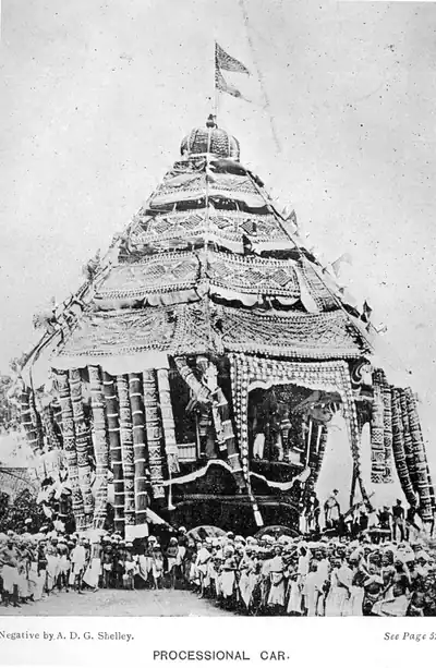 Old photo of a huge carved processional temple car