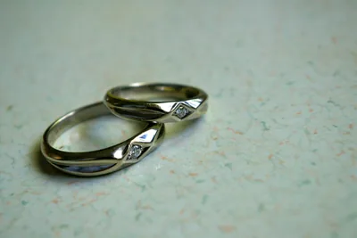 Two wedding rings lying side by side